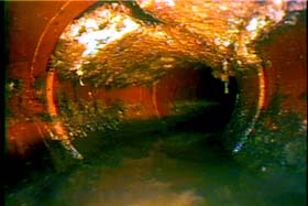 mineral deposits in a sewer line
