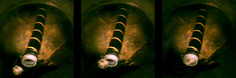 the vacuum sucking up a ball of grease